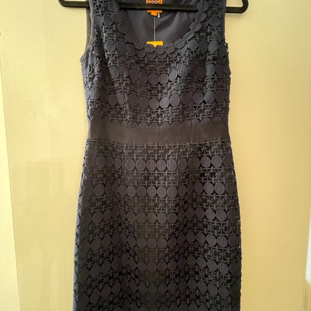 Tory Burch Navy lace sheath with gross grain ribbon waist. Side zip closure.